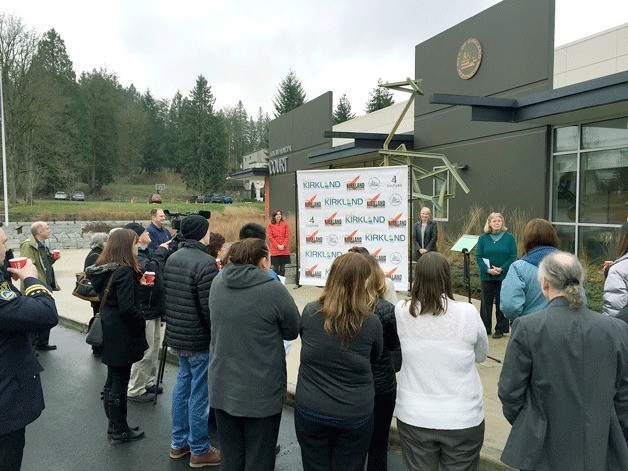 Kirkland City Council member Penny Sweet addresses the crowd at the Kirkland Public Safety Building during the unveiling of the crane sculpture on Tuesday.