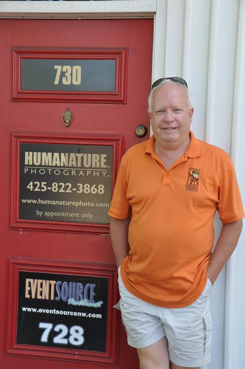 Redmond resident Bob Gassen stands in front of his Kirkland photography studio Humanature Photography.