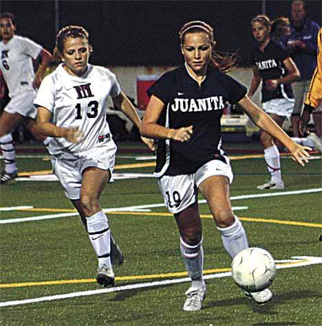Juanita High School's Tori Lee bring the ball to mid field at Islander Stadium during her team's game at Mercer Island. Juanita lost the game 3-1 on Sept. 15.