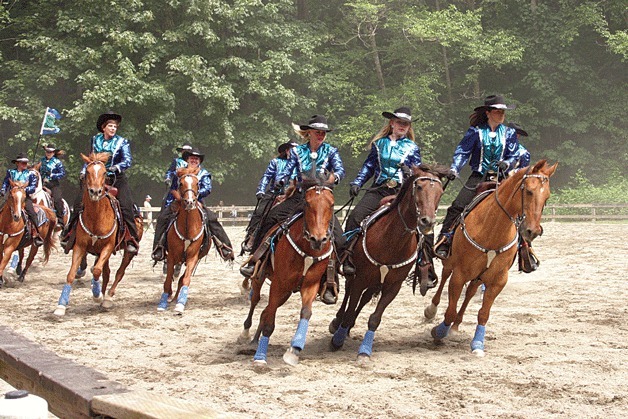 A horse drill team performs during the Bridle Trails Parks Foundation’s Party in the Park event.