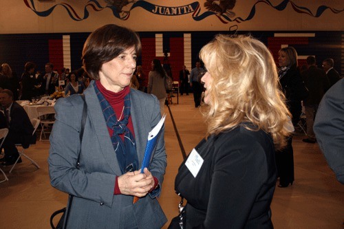 Former astronaut Dr. Bonnie J. Dunbar speaks with a guest of the Lake Washington Schools Foundation Benefit Luncheon held at Juanita High School on Wednesday. Dunbar was the key note speaker for the event.
