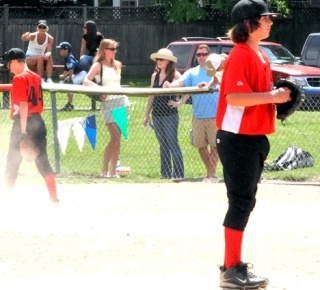 A Kirkland American Little League parent took this photo of Saturday's baseball game at Everest Park. The KALL Board did not prohibit Jodi Scheffler - a mom charged with assaulting a 12-year-old May 2 - from attending the game (she is pictured in this photo sitting on the bench