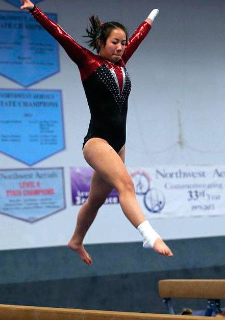 Juanita High School junior Millie Andrilenas is one of the top gymnasts in the state this season.