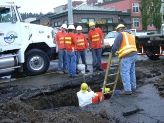 Over a dozen Northshore Utility District workers worked to replace a burst water main underneath 98th Avenue Northeast.