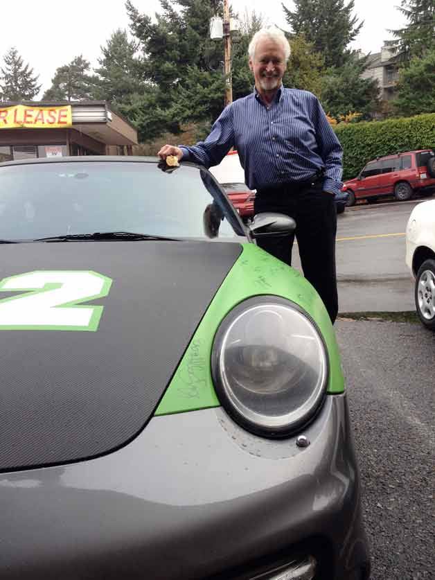 Bellevue resident J. DeBruler has remade his car for the in the Seahawk colors.
