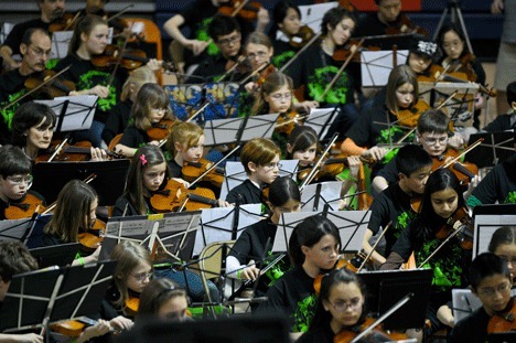 Nearly 400 string musicians play during the String Jam '10 event at the Juanita Field House in Kirkland Saturday. The fund-raiser event was also a Guinness Book of World Records attempt for the 'largest string ensemble under one roof.'