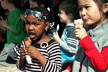 Students from St. John's Preschool enjoy ice cream cones during Free Cone Day at Ben & Jerry's in downtown Kirkland in 2010.