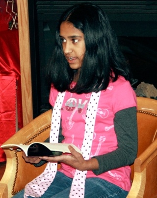 Eleven-year-old Maya Ganesan of Redmond reads her book