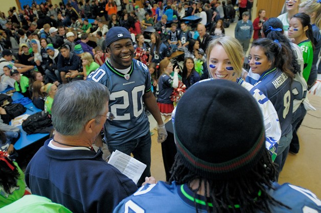 Seahawk running backs Justin Forsett (20) and Marshawn Lynch (24) made an appearance at Juanita High School in Kirkland on Tuesday.