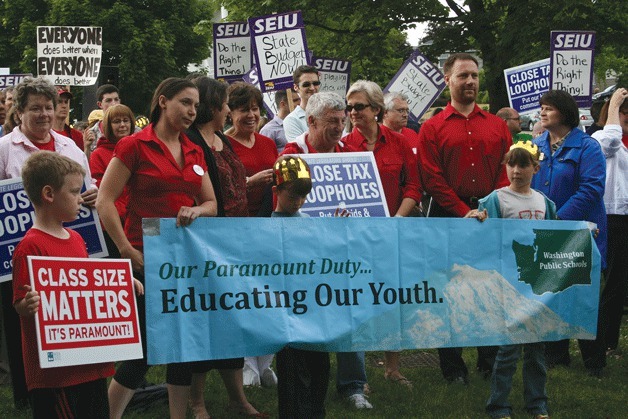 Nearly 300 Kirkland residents and members of political action committees gathered at Heritage Park in Kirkland on Wednesday evening to let legislators know they want a budget passed.