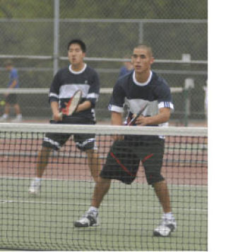 Jake Ichikawa (left) and Dahyuk Hahm play against the Bothell number one doubles team on Sept. 19.