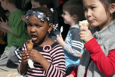 Students from St. John's Preschool enjoy ice cream cones during Free Cone Day at Ben & Jerry's in downtown Kirkland Tuesday.
