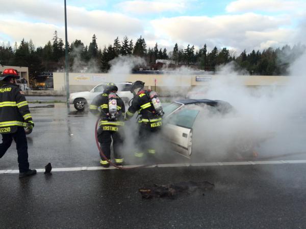 Kirkland firefighters put out a car fire on southbound I-405.