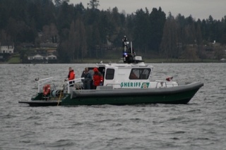 County Sheriff's Marine Unit deputies deploy sonar and cameras to search for a body of a suspected drowning victim Tuesday.
