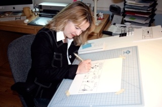 Kirkland Stay-at-home mom Jodie Sarah Masiwchuk draws cartoons in her home office. The artist created Suburban Sarah