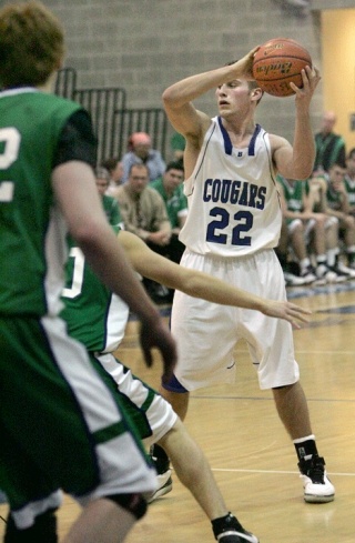 Bothell's Robby Storm (No. 22) is guarded by the Woodinville defense during third quarter action of a game at Bothell High School on Jan. 16.