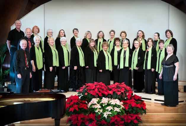 The Lake Washington Singers perform two annual spring and winter concerts. This year’s spring concert will be at 7:30 p.m. on May 18 at the Northlake Unitarian Universalist Church.  Below: Lake Washington Singers member Diane Underwood  (front) with president Karen Anderson (center) and Sandra Saenz at Anderson’s Kirkland home.