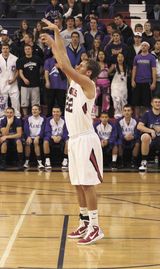 Juanita's Ryan Reid hits a foul shot during the Rebels home loss to Lake Washington in early December.