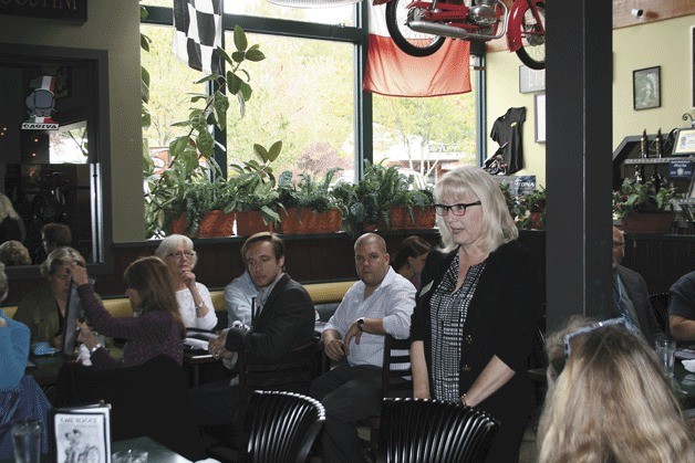 Kirkland Mayor Joan McBride speaks to business people at Cafe Veloce during a Totem Lake event on Monday.