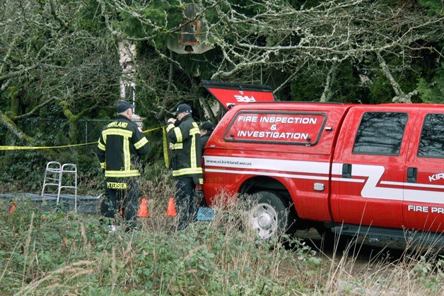 Kirkland Fire investigators were on scene of a Finn Hill house fire early Friday morning after confirming that a woman died during the incident.