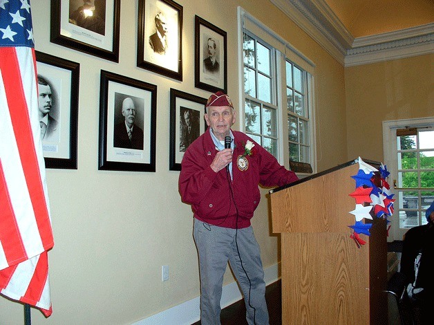 Joseph Regan addresses a packed room at the Kirkland Heritage Society on May 25. Regan was a prisoner of war for more than five months before being released by General Patton and his troops.