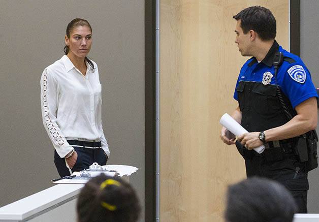 Hope Solo enters the courtroom at the Kirkland Justice Center on Monday during her court appearance.