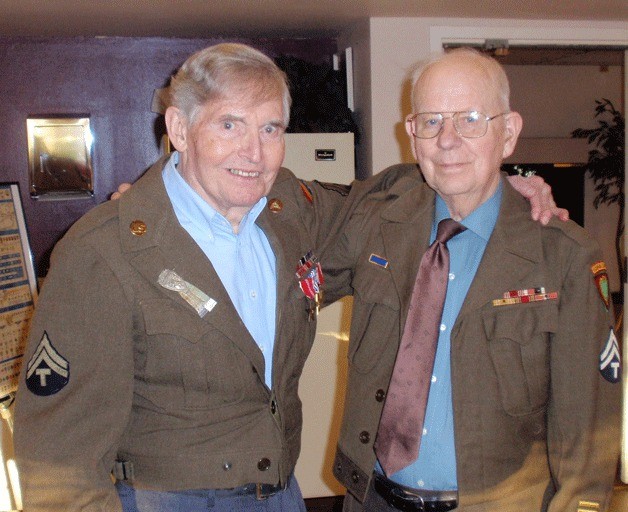 Madison House residents Rollin Hurd (left) and Don Ness served their country during World War II in the Army. The facility honored the men on Monday.
