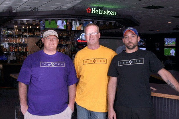 Co-owners Brett Brophy and Justin Boyd stand with chef Ron Guisleman at Dub Pub sports bar