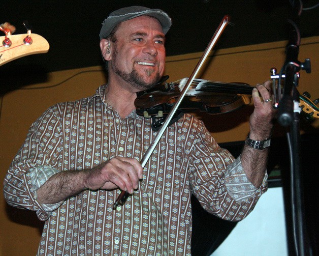 Local musician Geoffrey Castle performs at the Wilde Rover