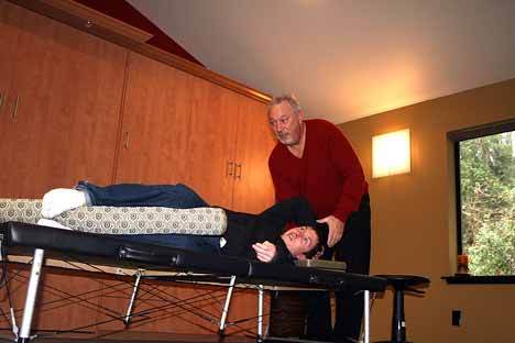 Richard Corbeil works through the Feldenkrais Method with brain injury patient