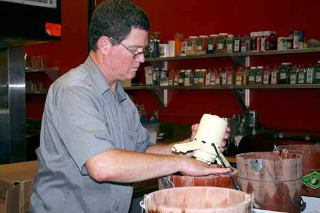 David Burton makes ice cream in Kirkland's Starry Nights Catering kitchen.
