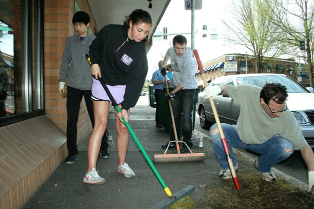 Lake Washington High School Key Club member Robin Cosbey (left)