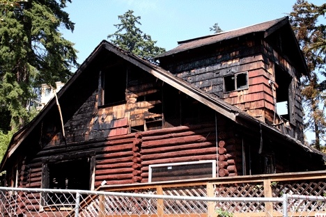 A fire destroyed this historic log home on Goat Hill Tuesday morning.
