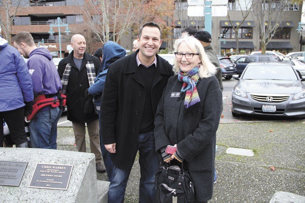 Chris Warren stands with Kirkland Mayor Joan McBride at the Plaza of Champions induction ceremony on Nov. 30.