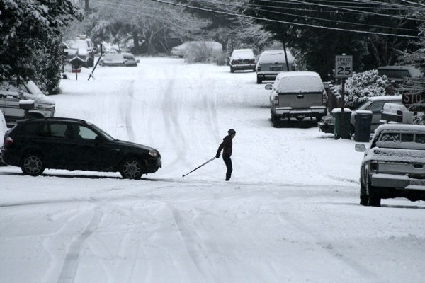 Snow is expected to hit the higher elevations in Kirkland late tonight like this street on Finn Hill in 2011.