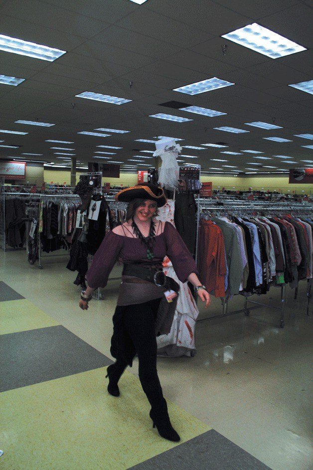 A Value Village “pirate” struts her stuff during the Value Village's recent costume fashion show. The Totem Lake store hosts a costume fashion show every Thursday and Saturday in October to promote their Halloween garb.