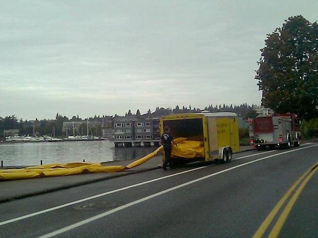 Crews contain a small petroleum spill that caused a sheen on Lake Washington Sunday.