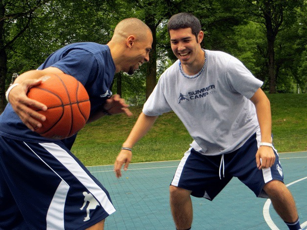 Kyle Keyes (left) and Jon Kaneshiro play a game of one-on-one at Grasslawn Park