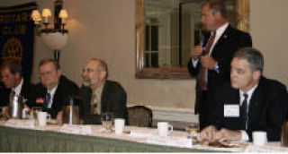 Candidates speak during a forum Oct. 13 at the Woodmark Hotel. From right: Rep. Ross Hunter