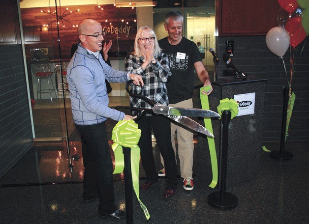 GoDaddy CEO Blake Irving at the ribbon cutting with Kirkland Mayor Joan McBride and GoDaddy Chief Architect Arnold Blinn.