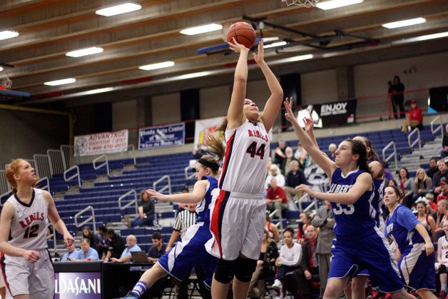 Juanita High School basketball player Jaissa Nunn powers to the hoop for a basket during a loss to Liberty Thursday.
