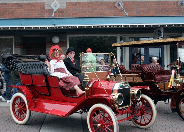 Sporting a red bonnet and 1909 Ford Model T