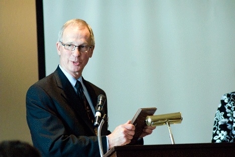 Kirkland Mayor James Lauinger receives a human services award.