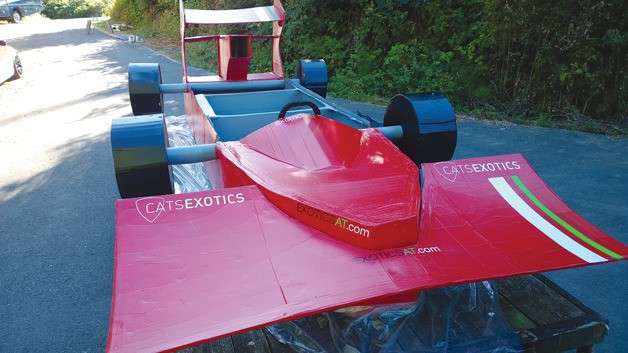 A Redmond team will hop aboard and race this cardboard Formula One race car on Lake Washington during the Summerfest Moss Bay Cardboard Boat Regatta on Aug. 10.
