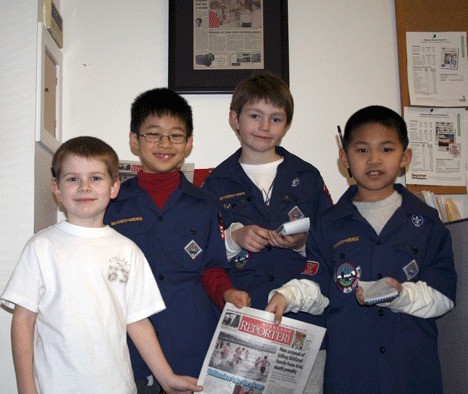 Mark Twain Elementary Cub Scouts visited the Kirkland Reporter office on Thursday. (From left) Alex Fox