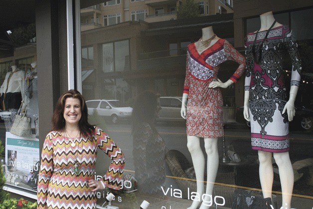 Via Lago owner Chapman McGrath Fina stands in front of her boutique