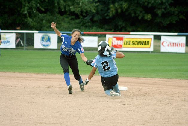 Kirkland player Kayla Henry is thrown out at second base during the Junior Softball World Series.
