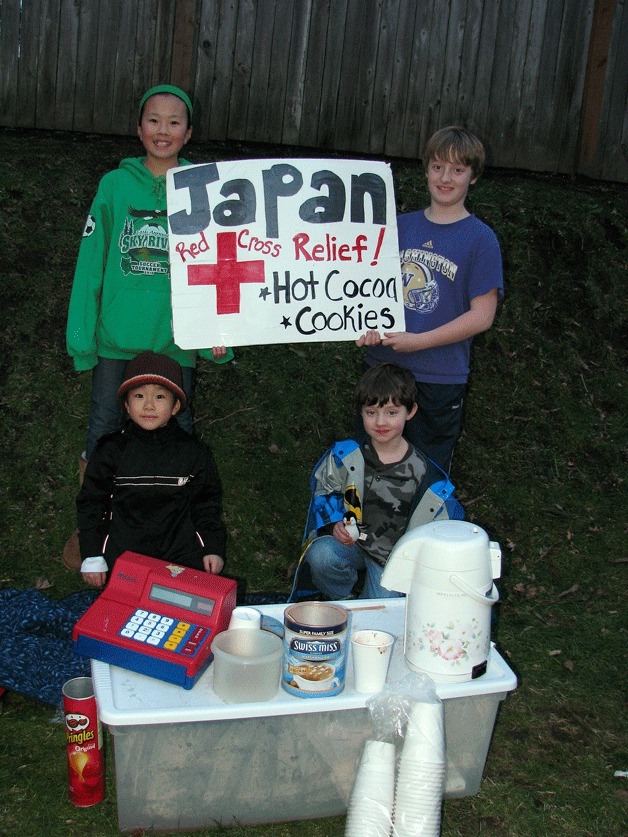 Kirkland kids spent last week offering Bridle Trails neighbors cookies and hot chocolate to raise money for the victims of the recent tsunami in Japan. Front