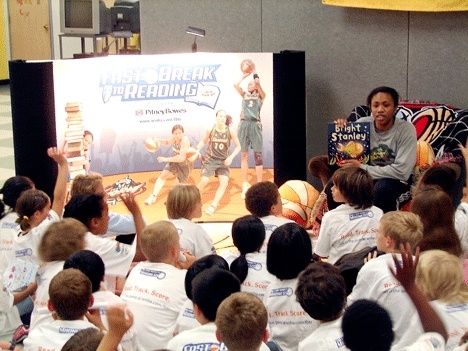 Seattle Storm guard Tanisha Wright visits local youth at the Kirkland Boys and Girls Club Aug. 24.