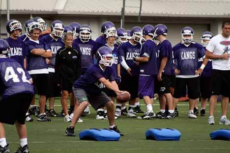 The Kangs' offense runs preseason drills at Lake Washington High School on Friday morning. The LWHS football team began preseason practices on Wednesday.